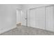 This bedroom has neutral walls, carpet flooring, baseboards, and a closet at 3109 Siena Cir, Las Vegas, NV 89128