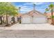 Charming single-story home with a two-car garage, landscaped yard, and desert-friendly plants at 3109 Siena Cir, Las Vegas, NV 89128
