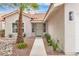 Inviting home facade with well-manicured garden, walkway, and ample lighting at 3109 Siena Cir, Las Vegas, NV 89128