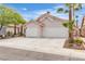 Charming home featuring well maintained landscaping and a spacious three car garage in a desirable neighborhood at 3109 Siena Cir, Las Vegas, NV 89128