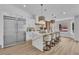 Lovely kitchen featuring stainless steel appliances, stone countertops, and bar stool seating at 3109 Siena Cir, Las Vegas, NV 89128