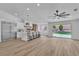 Bright kitchen with a waterfall island, stainless steel appliances, and seamless access to outdoor living at 3109 Siena Cir, Las Vegas, NV 89128