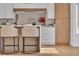 Stylish kitchen with a breakfast bar, modern appliances, and a bright, open feel at 3109 Siena Cir, Las Vegas, NV 89128