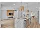 Spacious kitchen with a large center island, modern lighting, and an open floor plan at 3109 Siena Cir, Las Vegas, NV 89128