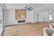 Bright living room features wood floors, a fireplace and access to the backyard at 3109 Siena Cir, Las Vegas, NV 89128