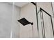 Shower with black rainfall shower head and tiled walls at 3109 Siena Cir, Las Vegas, NV 89128