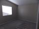 Bright bedroom with large window and neutral carpet at 319 Mulberry Glen Dr, North Las Vegas, NV 89031