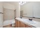 Bathroom with double sinks, wood-style flooring, tile backsplash, and a shower-tub combo at 3805 Specula Wing Dr, North Las Vegas, NV 89084