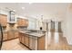 Modern kitchen featuring granite countertops, stainless steel appliances, and ample cabinet space at 3805 Specula Wing Dr, North Las Vegas, NV 89084