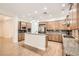 Spacious kitchen with stainless steel appliances, granite countertops, and an open layout at 3805 Specula Wing Dr, North Las Vegas, NV 89084