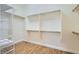Walk-in closet with custom shelving for optimal storage at 3805 Specula Wing Dr, North Las Vegas, NV 89084