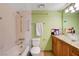 Bright bathroom features a shower-tub combo and a vanity with a vessel sink at 3823 S Maryland Pkwy # P1, Las Vegas, NV 89119