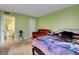 Well-lit bedroom offers space for furniture, and a doorway to a bathroom at 3823 S Maryland Pkwy # P1, Las Vegas, NV 89119
