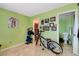 Bright bedroom featuring tiled flooring and access to a bathroom at 3823 S Maryland Pkwy # P1, Las Vegas, NV 89119