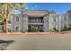 Attractive two-story condo with stucco exterior and balcony entrance in a well-kept community at 3823 S Maryland Pkwy # P1, Las Vegas, NV 89119