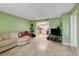 Living room with adjacent kitchen and comfortable sectional sofa at 3823 S Maryland Pkwy # P1, Las Vegas, NV 89119