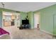 Inviting living room with tile flooring, neutral paint, and an open doorway to kitchen at 3823 S Maryland Pkwy # P1, Las Vegas, NV 89119