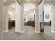 Luxurious bathroom suite with separate vanities, spa tub, and stone accents at 4208 Agosta Luna Pl, Las Vegas, NV 89135