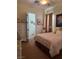 Comfortable bedroom featuring a cozy bed, dresser, and ample natural light at 4208 Agosta Luna Pl, Las Vegas, NV 89135