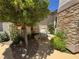 Secluded patio garden with comfortable seating, creating a tranquil outdoor retreat at 4208 Agosta Luna Pl, Las Vegas, NV 89135