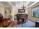 Elegant dining room featuring a chandelier and an area rug at 4208 Agosta Luna Pl, Las Vegas, NV 89135