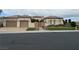 Inviting home with well-manicured landscaping and a spacious three-car garage at 4208 Agosta Luna Pl, Las Vegas, NV 89135