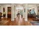 Spacious foyer with gleaming hardwood floors and elegant architectural details, creating a grand entrance at 4208 Agosta Luna Pl, Las Vegas, NV 89135