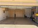 A spacious garage contains built in storage cabinets for organization at 4208 Agosta Luna Pl, Las Vegas, NV 89135