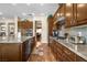 This kitchen features custom cabinets, stainless steel appliances, and granite countertops at 4208 Agosta Luna Pl, Las Vegas, NV 89135