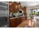 Modern kitchen featuring stainless steel appliances, granite countertops, and ample cabinet space at 4208 Agosta Luna Pl, Las Vegas, NV 89135