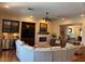 Comfortable living room with built-ins, fireplace, and hardwood flooring at 4208 Agosta Luna Pl, Las Vegas, NV 89135
