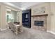 Cozy main bedroom with fireplace and plush seating at 4208 Agosta Luna Pl, Las Vegas, NV 89135