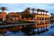 Buildings reflecting on the water offering a serene waterfront view at 4208 Agosta Luna Pl, Las Vegas, NV 89135