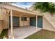 Cozy carport featuring storage with security gates, offering shade, and secure parking at 4213 Essex Green Ct, Las Vegas, NV 89110