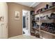 This closet has custom built-in shelving and ample storage space for shoes and accessories at 4213 Essex Green Ct, Las Vegas, NV 89110