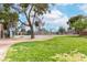 Well-maintained tennis courts surrounded by lush landscaping, providing a recreational amenity for residents at 4213 Essex Green Ct, Las Vegas, NV 89110