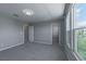 Neutral bedroom offering plush carpet, ample natural light, and a walk-in closet at 4589 Swimming Minnow Ave, Las Vegas, NV 89141
