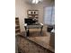 Bedroom with a desk, shelves, carpet, and window at 5020 Wildroot Rd, Las Vegas, NV 89130