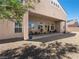 Covered patio with desert landscaping and a private backyard at 5120 Mirage Garden St, Las Vegas, NV 89130