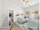 Stylish bedroom with two twin beds, ceiling fan, and a walk-in closet at 5120 Mirage Garden St, Las Vegas, NV 89130