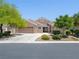 Charming one-story home with a three-car garage and mature landscaping at 5120 Mirage Garden St, Las Vegas, NV 89130