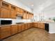 Modern kitchen with stainless steel appliances, sleek cabinetry, and a large island at 5120 Mirage Garden St, Las Vegas, NV 89130