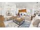 Spacious living room featuring hardwood floors, neutral paint, and lots of natural light at 5120 Mirage Garden St, Las Vegas, NV 89130