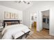 Comfortable bedroom showing ensuite bathroom and a spacious walk-in closet at 5120 Mirage Garden St, Las Vegas, NV 89130