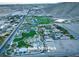 Aerial view of the community, Lone Mountain Park, tennis courts and desert landscape at 5236 Sunstone Mesa Dr, Las Vegas, NV 89166
