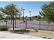 Community basketball court with benches and lighting available for play at 5236 Sunstone Mesa Dr, Las Vegas, NV 89166