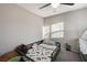 A bedroom features a toddler bed, a crib, and playful decor at 5236 Sunstone Mesa Dr, Las Vegas, NV 89166
