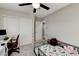 Bedroom with a toddler bed, desk, and closet at 5236 Sunstone Mesa Dr, Las Vegas, NV 89166
