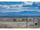 Expansive city view showcases Las Vegas skyline, mountains, and new development in the surrounding neighborhood at 5236 Sunstone Mesa Dr, Las Vegas, NV 89166