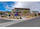A neighborhood playground with colorful play structure and a glimpse of the beautiful homes in the area at 5236 Sunstone Mesa Dr, Las Vegas, NV 89166